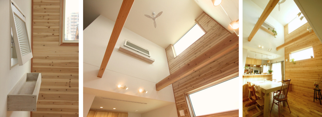 杉板張りの壁と小窓を組み合わせた木の質感が心地よい室内スペース。梁と杉板張りが映える吹抜け天井と自然光が差し込むリビング空間。壁一面の杉板張りと吹抜けが開放感を生むダイニングスペース