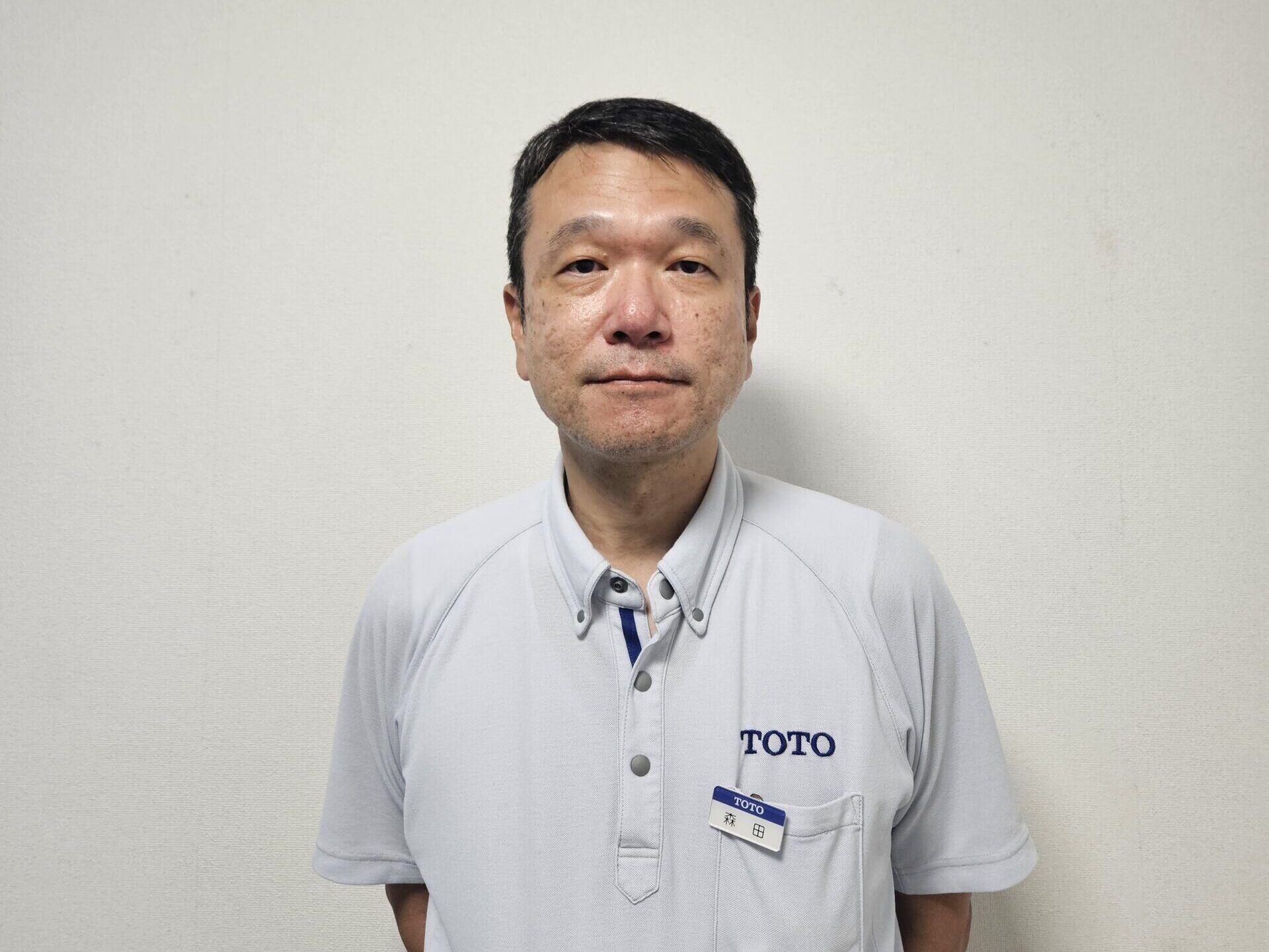 TOTO株式会社 レストルーム事業部 衛陶生産本部 衛陶技術部 部長の森田さんのポートレート