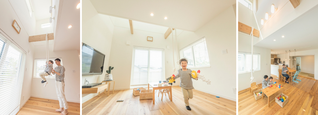 吹抜けのあるリビングで、ロープ遊びを楽しむ親子ののびのびした時間。屋久島の杉の無垢床で走り回る子どもが映える、明るいリビング空間。リビングとつながるダイニングで、家族それぞれが思い思いに過ごす時間