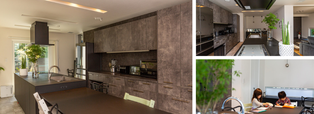 モノトーンと自然素材で統一した、並行型レイアウトのスタイリッシュなキッチン。グリーンを取り入れたシンプルモダンなキッチンと作業しやすいカウンター。キッチン横のダイニングで子どもたちが並んで作業する、見守りやすい間取り