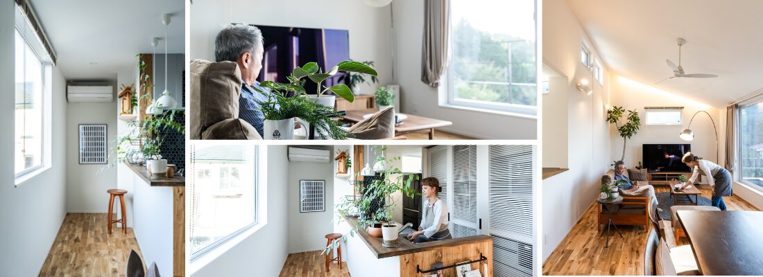 観葉植物を配した、窓に面した明るいキッチンカウンター。大きな窓から自然光が入る、家族がくつろぐ二階リビング。